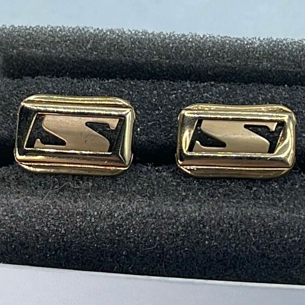 Vintage Anson gold tone shiny matte open design cufflinks.